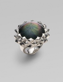 A faceted dome of black mother-of-pearl is richly surrounded by a stud-look zigzag setting of sterling silver. Black mother-of-pearl Sterling silver Diameter, about 1¼ Imported