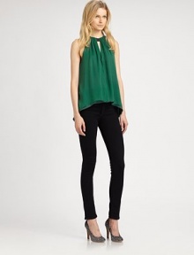 Contrasting leather halter tops this lengthy silk top with front-to-back cutouts and a tiered hem. Leather halterKeyhole cutoutTiered cropped front hemBack keyhole cutoutBody: SilkTrim: LeatherDry clean with leather specialistImported of Italian fabricModel shown is 5'11 (178cm) wearing US size Small.This style runs true to size. We recommend ordering your usual size for a standard fit. Contrasting leather halter tops this lengthy silk top with front-to-back cutouts and a tiered hem. Leather halterKeyhole cutoutTiered cropped front hemBack keyhole cutoutBody: SilkTrim: LeatherDry clean with leather specialistImported of Italian fabricModel shown is 5'11 (178cm) wearing US size Small.This style runs true to size. We recommend ordering your usual size for a standard fit.