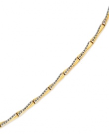 Golden and glamorous. A stylish X-patterned bracelet dazzles with diamond accents. Crafted from 14k gold. Approximate length: 7-1/2 inches. Golden and glamorous. A stylish X-patterned bracelet dazzles with diamond accents. Crafted from 14k gold. Approximate length: 7-1/2 inches.