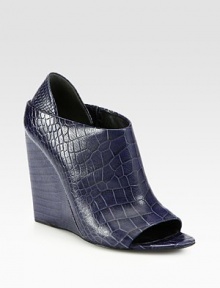 Crocodile-print leather adds stylish impact to this elevated wedge with a classic open toe. Self-covered wedge, 4½ (115mm)Crocodile-print leather upperOpen toeLeather lining and solePadded insoleImported Crocodile-print leather adds stylish impact to this elevated wedge with a classic open toe. Self-covered wedge, 4½ (115mm)Crocodile-print leather upperOpen toeLeather lining and solePadded insoleImported