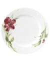 Painterly lilies bloom around this porcelain dinner plate, creating a beautiful arrangement with the rest of Oleg Cassini's Sweet Blossom dinnerware.