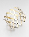 Silver studs connect bands of sterling silver, some with goldplating, in a striking wide, woven trellis pattern.Sterling silver and 18k goldplated sterling silverDiameter, about 4 (adjustable)Width, about 2¼Made in Italy