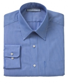Tommy Hilfiger knows you can never go wrong with this tailored, striped blue button-down. Every guy needs at least one in his wardrobe. Tommy Hilfiger knows you can never go wrong with this tailored, striped blue button-down. Every guy needs at least one in his wardrobe.