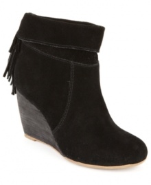 Fashion on the fringe. The Holiday wedge booties from Sugar are smooth in suede and feature a little bit of embellishment on the back for that added touch. Fashion on the fringe. The Holiday wedge booties from Sugar are smooth in suede and feature a little bit of embellishment on the back for that added touch.