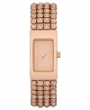 Embrace the rosy sparkle on this ladylike timepiece from the always chic DKNY.