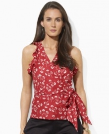 Lauren by Ralph Lauren's flirty wrap silhouette exudes undeniable femininity in a sleeveless blouse, accented with a vibrant print and ruffled sleeves for a charming summer look. Lauren by Ralph Lauren's flirty wrap silhouette exudes undeniable femininity in a sleeveless blouse, accented with a vibrant print and ruffled sleeves for a charming summer look.