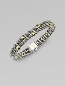 Beautifully textured sterling silver with radiant 18k gold accents in a stunning double row design. Sterling silver18k goldDiameter, about 2¼Box clasp closureImported 