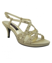 Get red-carpet ready in these strappy sandals by Nina. The perfect pairing for your evening gown or little black dress, the Norilio Evening Sandal features sparkling jewel embellishments and an adjustable ankle strap. Get red-carpet ready in these strappy sandals by Nina. The perfect pairing for your evening gown or little black dress, the Norilio Evening Sandal features sparkling jewel embellishments and an adjustable ankle strap.