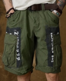Heavy-duty canvas cargo shorts are faded and frayed for a rustic, surplus-inspired look with a downtown vibe. Heavy-duty canvas cargo shorts are faded and frayed for a rustic, surplus-inspired look with a downtown vibe.