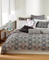 Soothing grey tones combine with pops of color in this Seneca duvet cover from Bar III, featuring a modern geometric diamond pattern for a look of casual style.