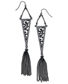 Ornate elegance. This pair of drop earrings from GUESS is crafted from hematite-tone mixed metal with glass crystal tassels and a filigree pattern for a refined touch. Approximate drop: 3-1/4 inches. Approximate diameter: 3/4 inch. Ornate elegance. This pair of drop earrings from GUESS is crafted from hematite-tone mixed metal with glass crystal tassels and a filigree pattern for a refined touch. Approximate drop: 3-1/4 inches. Approximate diameter: 3/4 inch.