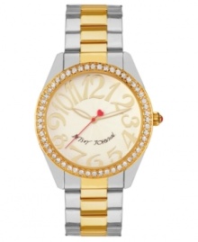 Shining example of pure fashion, by Betsey Johnson. This two-tone watch features crystal accents and eye-catching numerals at the dial.