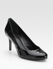 Glistening patent leather in a low-cut, round toe design with a goldtone designer emblem at the heel. Self-covered heel, 3 (75mm)Patent leather upperLeather liningBuffed leather solePadded insoleImportedOUR FIT MODEL RECOMMENDS ordering one size up as this style runs small. Glistening patent leather in a low-cut, round toe design with a goldtone designer emblem at the heel. Self-covered heel, 3 (75mm)Patent leather upperLeather liningBuffed leather solePadded insoleImportedOUR FIT MODEL RECOMMENDS ordering one size up as this style runs small.