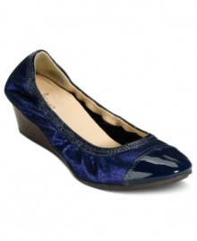 The Milly wedges by Cole Haan are chic and sophisticated with patent leather shine and the hidden comfort of Nike AIR technology. The Milly wedges by Cole Haan are chic and sophisticated with patent leather shine and the hidden comfort of Nike AIR technology.