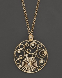 From the Mauresque collection, a round pendant in 18 Kt. yellow gold; with signature ruby accent. Designed by Roberto Coin. From the Mauresque collection, a round pendant in 18 Kt. yellow gold; with signature ruby accent. Designed by Roberto Coin.