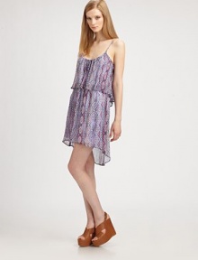A muted tribal print highlights silk chiffon in an airy layered tank.Spaghetti strapsDrawstring scoopneckCropped overlayHem longer in backAbout 23 from shoulder to hemSilkDry cleanImportedModel shown is 5'9½ (176cm) wearing US size Small. A muted tribal print highlights silk chiffon in an airy layered tank.Spaghetti strapsDrawstring scoopneckCropped overlayHem longer in backAbout 23 from shoulder to hemSilkDry cleanImportedModel shown is 5'9½ (176cm) wearing US size Small.
