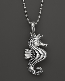 A playful sea creature dangles from a sterling silver ball chain on this everyday necklace from Lagos. A playful sea creature dangles from a sterling silver ball chain on this everyday necklace from Lagos.