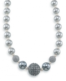 This tinsel-colored necklace will add an extra twinkle to your outfit. Crafted by Carolee, necklace features graduated pewter glass pearls, charcoal glass pearls and sparkling crystal glass fireballs. Set in silvertone mixed metal. Approximate length: 16 inches + 2-inch extender. This tinsel-colored necklace will add an extra twinkle to your outfit. Crafted by Carolee, necklace features graduated pewter glass pearls, charcoal glass pearls and sparkling crystal glass fireballs. Set in silvertone mixed metal. Approximate length: 16 inches + 2-inch extender.