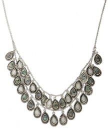 Drape yourself in jewels. Lucky Brand's mixed base metal Chandelier Collar necklace features semi-precious abalone shells with semi-precious Mother of Pearl accents. Approximate length: 16-3/4 inches. Approximate drop: 1-1/4 inches. Drape yourself in jewels. Lucky Brand's mixed base metal Chandelier Collar necklace features semi-precious abalone shells with semi-precious Mother of Pearl accents. Approximate length: 16-3/4 inches. Approximate drop: 1-1/4 inches.