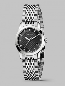 From the G-Timeless Collection. A prestigous design with classic, round face and diamond-patterned dial is crafted in the durability and lasting elegance of stainless steel. Stainless steel case diameter; 27mm (1.06) Precision quartz movement Water-resistant to 3ATM Stainless steel bezel Round face Black diamond-pattern dial Markers Second hand Date display at 4 o'clock Stainless steel bracelet Made in Switzerland From the G-Timeless Collection. A prestigous design with classic, round face and diamond-patterned dial is crafted in the durability and lasting elegance of stainless steel. Stainless steel case diameter; 27mm (1.06) Precision quartz movement Water-resistant to 3ATM Stainless steel bezel Round face Black diamond-pattern dial Markers Second hand Date display at 4 o'clock Stainless steel bracelet Made in Switzerland