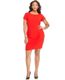 Dazzle from desk to dinner with DKNYC's short sleeve plus size dress, highlighted by a pleated accent. Dazzle from desk to dinner with DKNYC's short sleeve plus size dress, highlighted by a pleated accent.