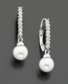 Simply elegant with ladylike touches. Earrings by Belle de Mer feature cultured freshwater pearl drops (8-9 mm) and sparkling, round-cut diamonds (1/4 ct. t.w.) in 14k white gold setting. Approximate Drop: 1/2 inch.