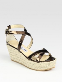 Mirror-like metallic leather straps uplifted by a timeless espadrille wedge and platform. Rope wedge, 3 (75mm)Rope platform, 1½ (40mm)Compares to a 1½ heel (40mm)Metallic leather upperAdjustable ankle strapLeather liningRubber solePadded insoleMade in Italy Mirror-like metallic leather straps uplifted by a timeless espadrille wedge and platform. Rope wedge, 3 (75mm)Rope platform, 1½ (40mm)Compares to a 1½ heel (40mm)Metallic leather upperAdjustable ankle strapLeather liningRubber solePadded insoleMade in Italy