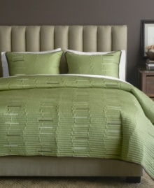 Luxe texture meets a serene green hue in this Key West quilt from Bryan Keith for a calming oasis in the bedroom. Lush quilted details form an uneven stripe design with pops of muted color interspersed.