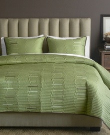 Luxe texture meets a serene green hue in this Key West quilt from Bryan Keith for a calming oasis in the bedroom. Lush quilted details form an uneven stripe design with pops of muted color interspersed. Luxe texture meets a serene green hue in this Key West quilt from Bryan Keith for a calming oasis in the bedroom. Lush quilted details form an uneven stripe design with pops of muted color interspersed.