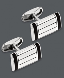 A dapper accent for any occasion: from office attire to black tie affairs. These sleek cuff links feature a rectangular shape, sterling silver setting and black onyx accents. Approximate length: 9/10 inch. Approximate width: 1/2 inch. A dapper accent for any occasion: from office attire to black tie affairs. These sleek cuff links feature a rectangular shape, sterling silver setting and black onyx accents. Approximate length: 9/10 inch. Approximate width: 1/2 inch.