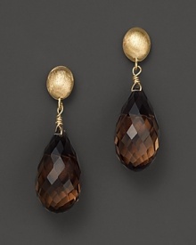 Smoky quartz drops dangle from 14K yellow gold settings. Smoky quartz drops dangle from 14K yellow gold settings.