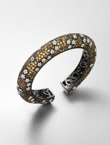 Charming enamel accented florals with multi-colored sapphires on a rhodium-plated sterling silver bangle. EnamelMulti-colored sapphiresRhodium-plated sterling silverDiameter, about 2.2Slip-on styleImported Charming enamel accented florals with multi-colored sapphires on a rhodium-plated sterling silver bangle. EnamelMulti-colored sapphiresRhodium-plated sterling silverDiameter, about 2.2Slip-on styleImported