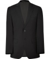Streamlined and sleek, this wool blazer from Baldessarini brings elegant appeal to any ensemble - Notched lapels, long sleeves, two-button closure, flap pockets, double back vent - Tailored slim fit - Wear with matching pants, jeans, or chinos