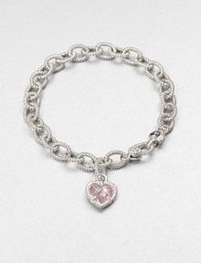 A sweet style with a textured sterling silver link chain and a pink crystal heart charm. Pink crystalSterling silverLength, about 7.5Lobster clasp closureImported 