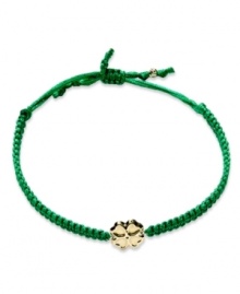 Luck stars in this bracelet. A 14k gold shamrock shines brightly in the center of this green nylon rope for a whimsically stylish effect. Bracelet adjusts to fit wrist. Approximate diameter: 3-1/2 inches. Luck stars in this bracelet. A 14k gold shamrock shines brightly in the center of this green nylon rope for a whimsically stylish effect. Bracelet adjusts to fit wrist. Approximate diameter: 3-1/2 inches.
