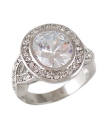 Put on the glitz in this ultra-glam design. Head-turning ring by City by City features dozens of round-cut crystals surrounding a bezel-set crystal center stone. Set in silver tone mixed metal. Size 7 and 8. Put on the glitz in this ultra-glam design. Head-turning ring by City by City features dozens of round-cut crystals surrounding a bezel-set crystal center stone. Set in silver tone mixed metal. Size 7 and 8.