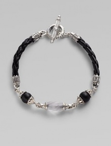 From the Iris Collection. From the carved frosted rock crystal bead to the smooth matte onyx beads and braided leather cord, this piece is a study in understated elegance. Sterling silver Toggle closure Length, about 7½ Imported From the Iris Collection. From the carved frosted rock crystal bead to the smooth matte onyx beads and braided leather cord, this piece is a study in understated elegance. Sterling silver Toggle closure Length, about 7½ Imported