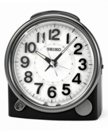 Rest assured of your wake-up call with this handsome modern clock from Seiko. Silvertone metal case and round white dial with logo and numeral indices. Luminous hands, constant light when alarm is set, ascending alarm with snooze and alarm reminder light. Three AA batteries included. Measures approximately 4-3/4 x 4-1/2 x 2-3/4 inches. Rest assured of your wake-up call with this handsome modern clock from Seiko. Silvertone metal case and round white dial with logo and numeral indices. Luminous hands, constant light when alarm is set, ascending alarm with snooze and alarm reminder light. Three AA batteries included. Measures approximately 4-3/4 x 4-1/2 x 2-3/4 inches.