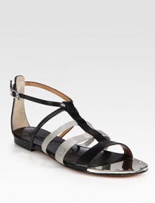 Give your ensemble a rocker-chic vibe with this strappy leather gladiator, roughened by mesh metal straps. Leather and mesh metal upperLeather lining and solePadded insoleImportedOUR FIT MODEL RECOMMENDS ordering one half size down as this style runs large. Give your ensemble a rocker-chic vibe with this strappy leather gladiator, roughened by mesh metal straps. Leather and mesh metal upperLeather lining and solePadded insoleImportedOUR FIT MODEL RECOMMENDS ordering one half size down as this style runs large.