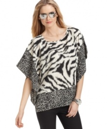 Add safari-style to your spring wardrobe with this mixed animal-printed MICHAEL Michael Kors top -- perfect for a chic weekend look! Add safari-style to your spring wardrobe with this mixed animal-printed MICHAEL Michael Kors top -- perfect for a chic weekend look!