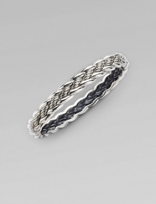 From the Woven Cable Collection. An elegant braid of sterling silver weaves textured and smooth strands into a sophisticated bangle. Sterling silver Diameter, about 2¼ Width, about ¼ Imported From the Woven Cable Collection. An elegant braid of sterling silver weaves textured and smooth strands into a sophisticated bangle. Sterling silver Diameter, about 2¼ Width, about ¼ Imported