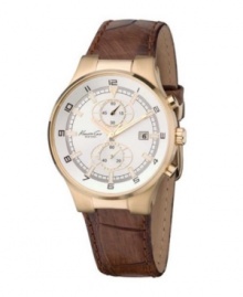 The perfect combination of a rugged exterior and an elegant center. This Kenneth Cole New York watch features a croc-embossed leather strap and stainless steel goldtone round case. White dial with goldtone stick indices, two subdials, logo and date window. Quartz movement. Water resistant to 50 meters. Limited lifetime warranty. The perfect combination of a rugged exterior and an elegant center. This Kenneth Cole New York watch features a croc-embossed leather strap and stainless steel goldtone round case. White dial with goldtone stick indices, two subdials, logo and date window. Quartz movement. Water resistant to 50 meters. Limited lifetime warranty.