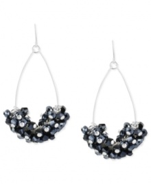 Beauty in bunches. This pair of orbital drop earrings from Kenneth Cole New York is crafted from silver-tone mixed metal with clusters of navy glass shaky beads making for a dynamic grouping. Approximate drop: 2-1/4 inches. Beauty in bunches. This pair of orbital drop earrings from Kenneth Cole New York is crafted from silver-tone mixed metal with clusters of navy glass shaky beads making for a dynamic grouping. Approximate drop: 2-1/4 inches.