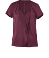 A polished and sophisticated look gets a touch of sexy with this silk blouse - A hint of added stretch makes it super-comfortable and flattering - Features a feminine sweetheart neckline, structured sleeves and a flowing drap at front - Pair with a pencil skirt and heels for the office, or with cropped jeans and flats for a weekend brunch