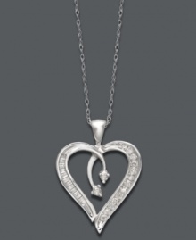 Give the gift of love. Perfect for any time of year, this intricate heart pendant shines with the addition of round and baguette-cut diamonds (1/5 ct. t.w.). Setting and chain crafted in 14k white gold. Approximate length: 18 inches. Approximate drop: 3/4 inch. Give the gift of love. Perfect for any time of year, this intricate heart pendant shines with the addition of round and baguette-cut diamonds (1/5 ct. t.w.). Setting and chain crafted in 14k white gold. Approximate length: 18 inches. Approximate drop: 3/4 inch.