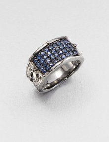 A tapered design in burnished sterling silver is defined by four rows of delicate blue sapphires.Sterling silverBlue sapphireAbout 2 diam.Imported