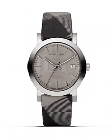 Burberry's ultramodern watch with matte steel casing, granite-tone face and check strap. Burberry's ultramodern watch with matte steel casing, granite-tone face and check strap.