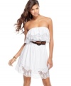 A faux-leather belt adds tough attitude to a superiorly femme dress where eyelets reign supreme! From Baby Phat.