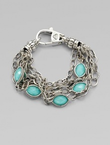Stations of bright, faceted, crystal accented turquoise stone set in sterling silver on detailed link chains. Crystal accented turquoise doubletsSterling silverLength, about 7Lobster clasp closureImported Stations of bright, faceted, crystal accented turquoise stone set in sterling silver on detailed link chains. Crystal accented turquoise doubletsSterling silverLength, about 7Lobster clasp closureImported