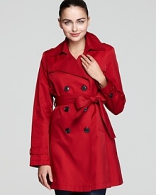 This take on the timeless double-breasted belted trench coat features a vibrant red hue and glossy black buttons to brighten up your look on even the rainiest day. This take on the timeless double-breasted belted trench coat features a vibrant red hue and glossy black buttons to brighten up your look on even the rainiest day.